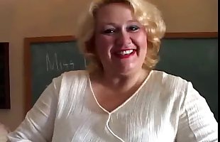 Chubby MILF teacher gets out her lovely big tits while she